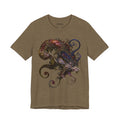 Front of What the Fire Keeps T-Shirt in Heather Olive, featuring a curling dragon in burgundy, violet and blue.