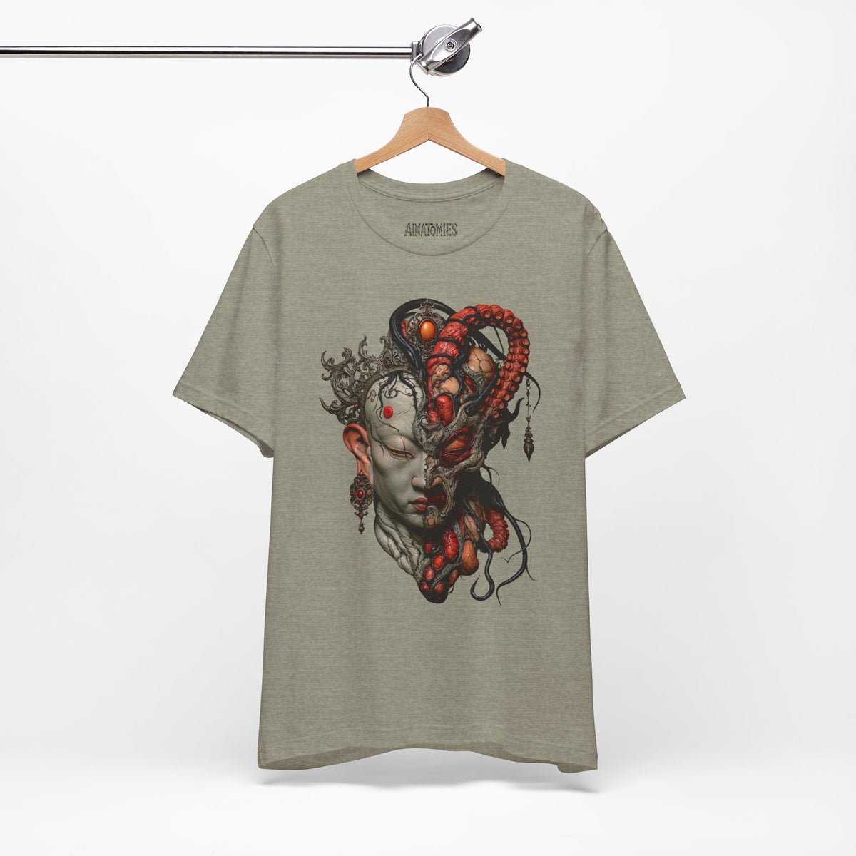 Hanging front view of The Unbroken Divide T-Shirt in Heather Stone, featuring a divided gray face with red anatomical forms.