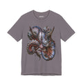 Front of The Patience of Wrath T-Shirt in Storm, featuring a horned face surrounded by blue, violet and coral forms.