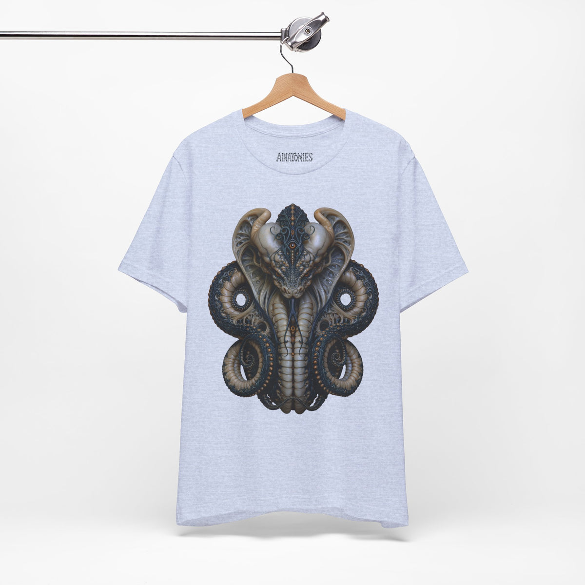 Hanging front view of The Refusal to End T-Shirt in Heather Prism Blue, featuring a symmetrical serpent portrait with coiled forms in teal and ivory.